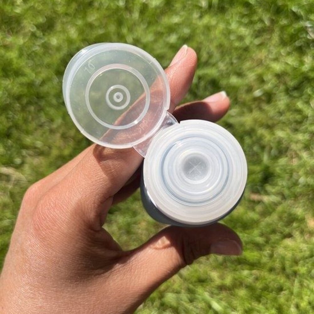 Set van 3 reisflesjes, roller top, crèmepotje & ring
